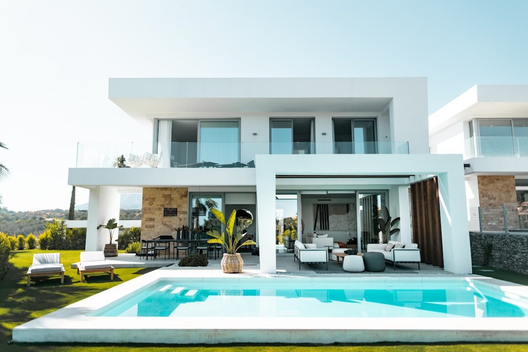 Modern architectural villa facade with pool
